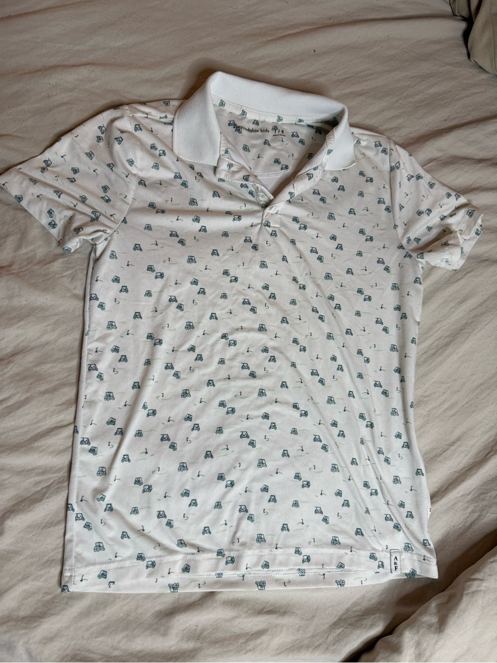 Abercrombie Kids White Golf Polo Shirt with Tiny Golf Cart Print